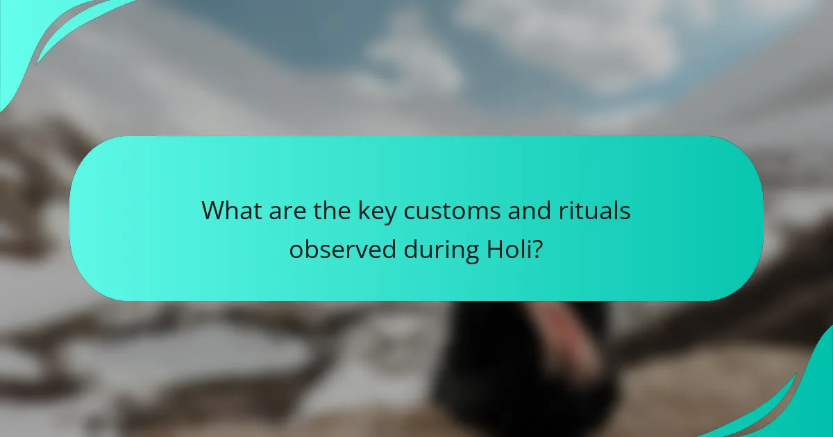What are the key customs and rituals observed during Holi?